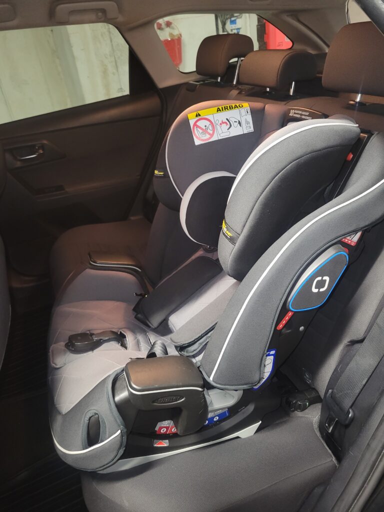 Siège auto enfant ISOFIX installé dans un VTC à Bordeaux